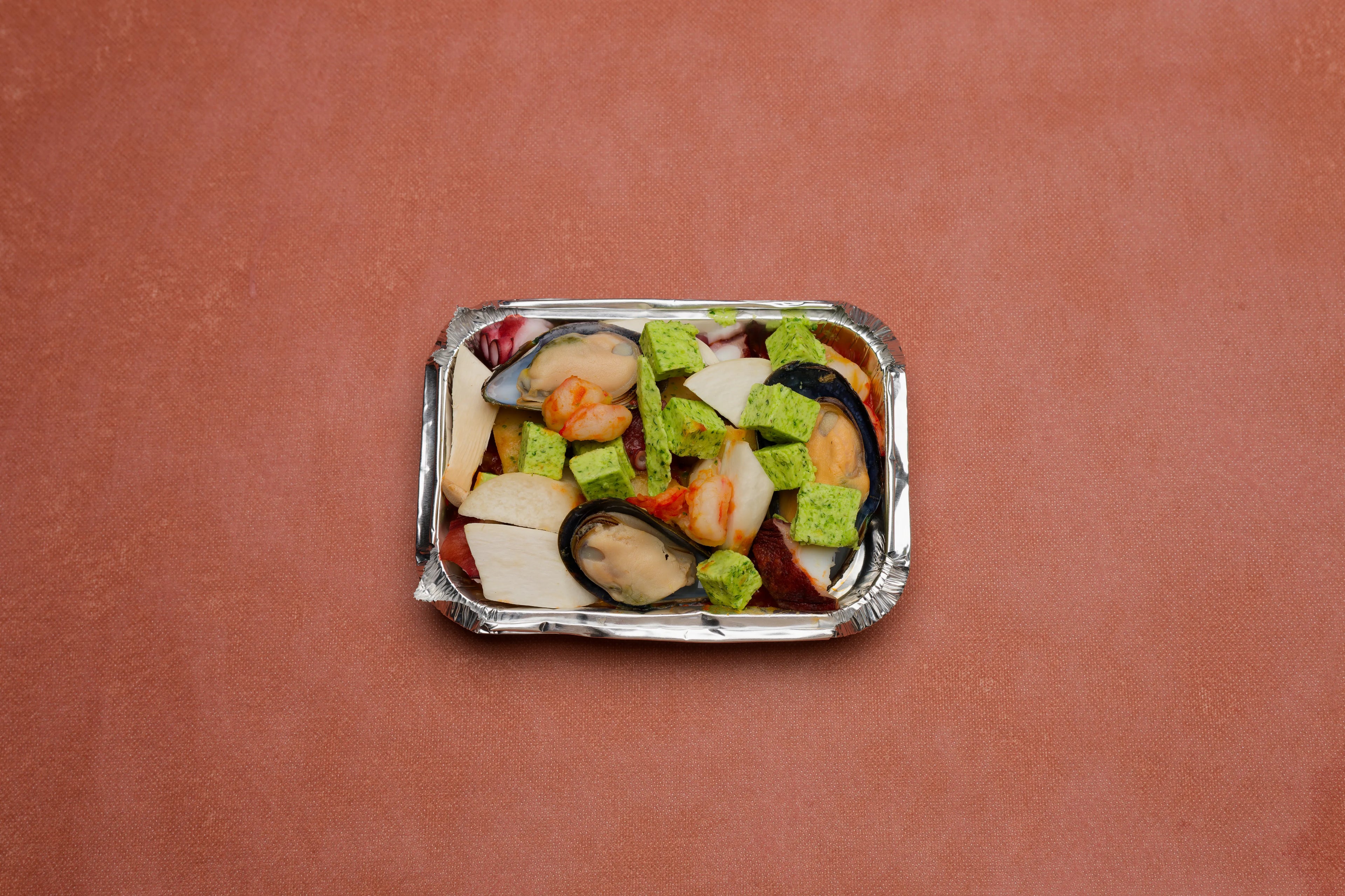 小海老とタコムール貝の香草ガーリックバター焼き